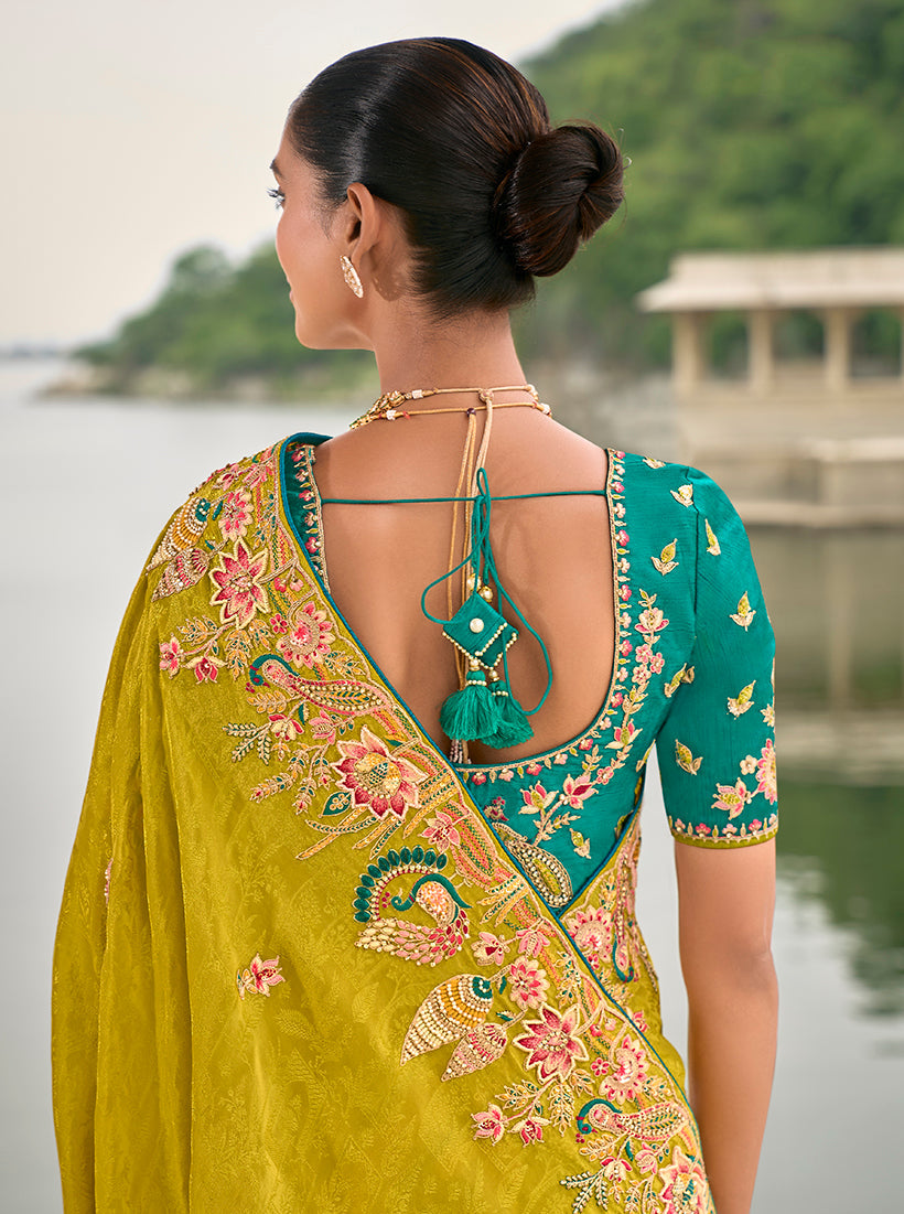Monjolika Fashion Pear Color Banarasi Silk Blend Sequin Embroidered With Heavy Patchwork Border Saree | Grocsy