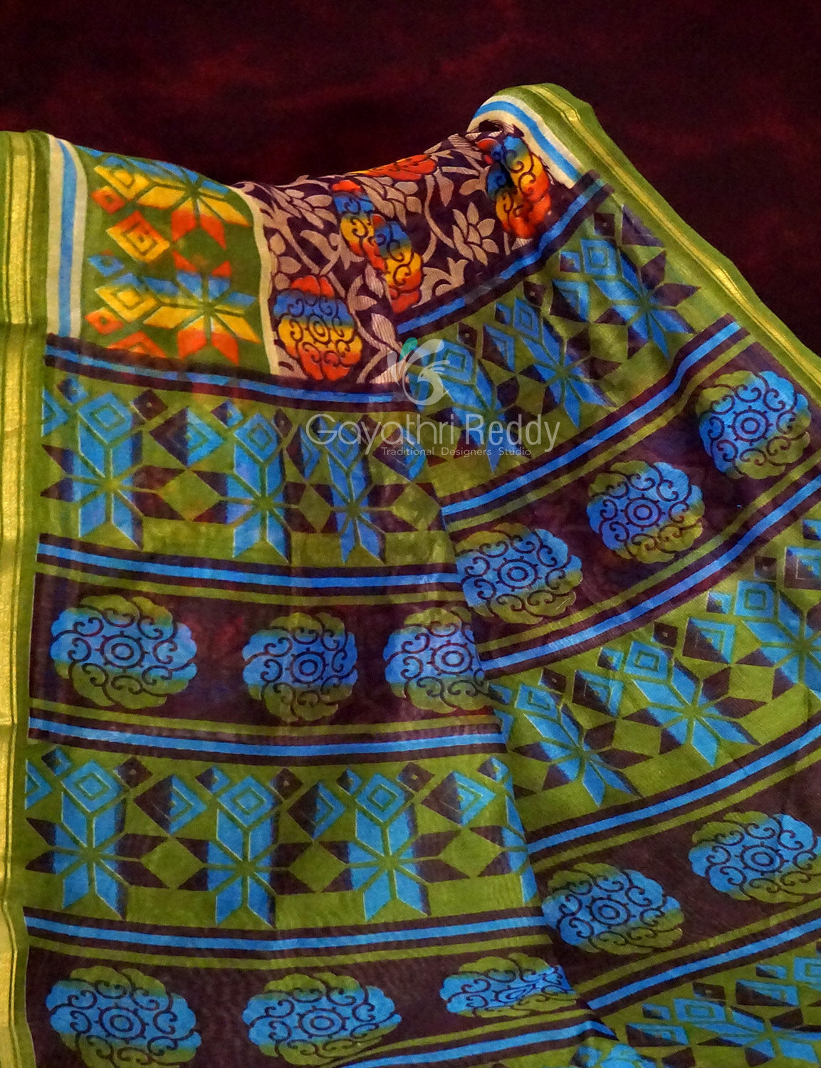 Shades of Dark Wine With Leaf Green Blouse Creeper Design Semi Chanderi Saree By Gayathri Reddy Designer Studio | Grocsy