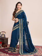 Monjolika Fashion Teal Blue Vichitra Silk Classic Saree with Embroidered Work | Grocsy