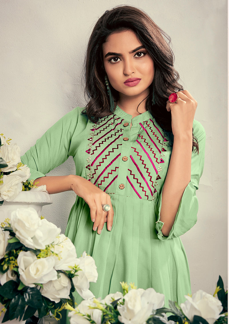 Monjolika Fashion Fancy Festive Wear Pista Green Color Rayon Fabric Thread Embroidered Kurti | Grocsy