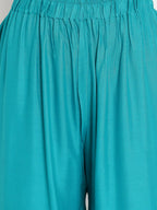 TAG 7 Women Turquoise Blue Solid Flared Palazzos | Grocsy
