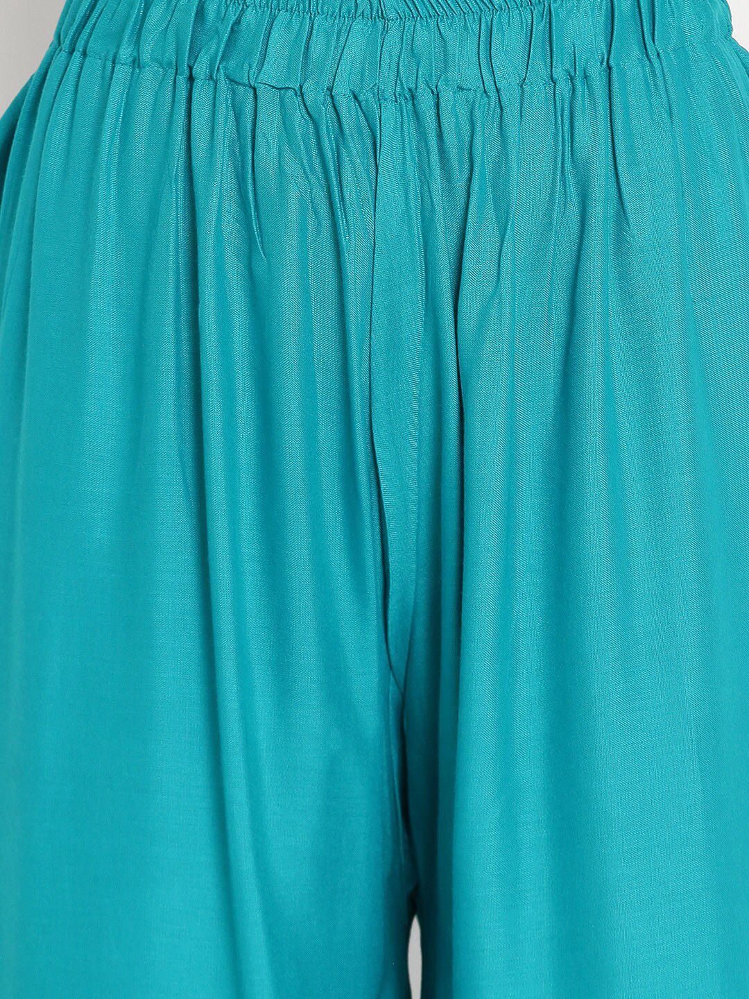 TAG 7 Women Turquoise Blue Solid Flared Palazzos | Grocsy