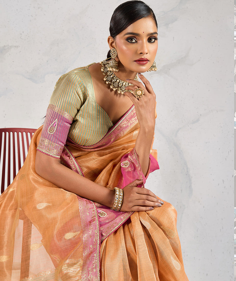 Monjolika Fashion Charming Light Orange Soft Tissue Linen Saree With Pretty Blouse Piece | Grocsy