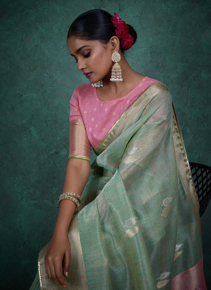 Monjolika Fashion A Glam Light Blue Linen Blend Woven Sequin Work Saree | Grocsy