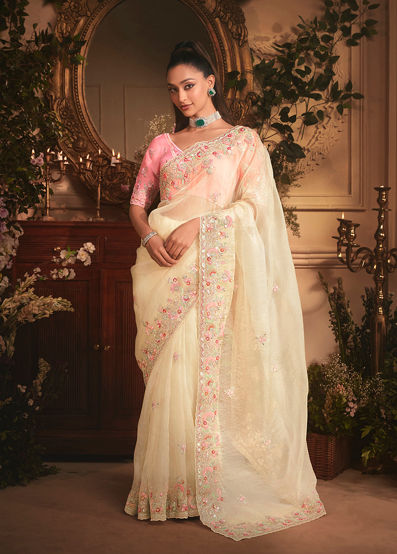 Monjolika Fashion Designer Cream Tissue Organza Saree With All Over Butta Work & Heavy Stone Embellished Border | Grocsy