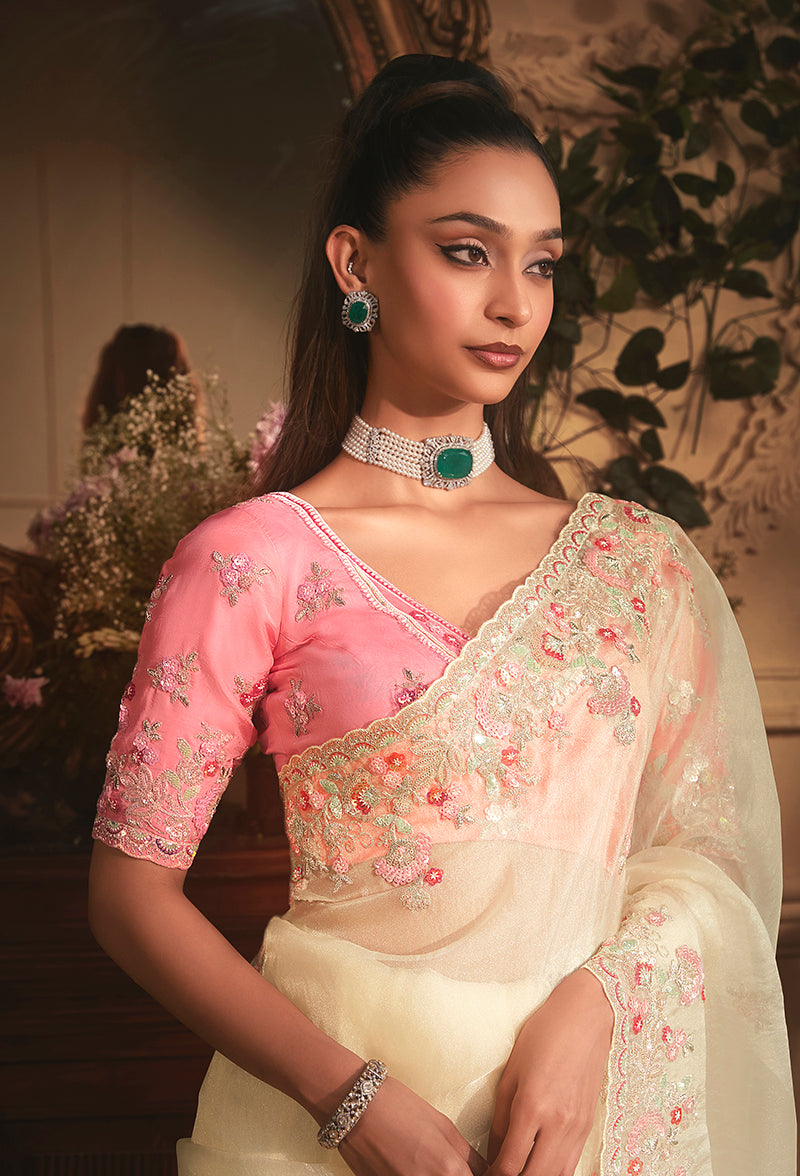 Monjolika Fashion Designer Cream Tissue Organza Saree With All Over Butta Work & Heavy Stone Embellished Border | Grocsy