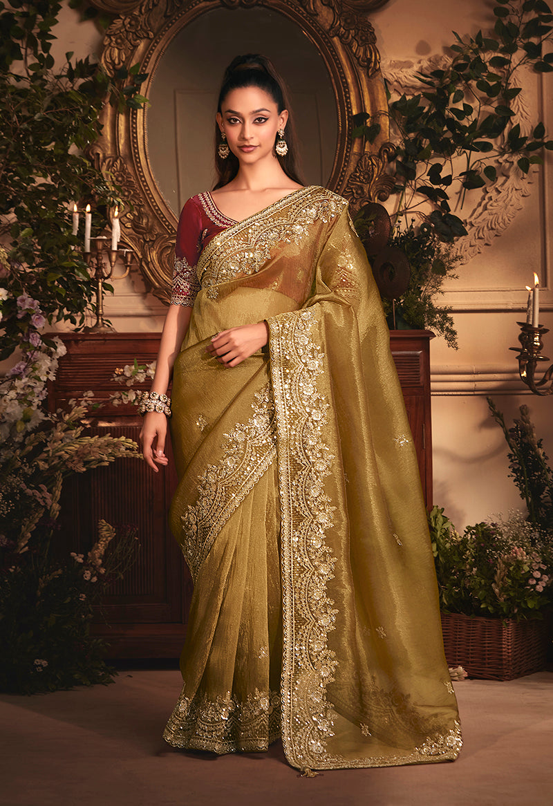 Monjolika Fashion Designer Golden Tissue Organza Saree With All Over Butta Work & Heavy Stone Embellished Border | Grocsy