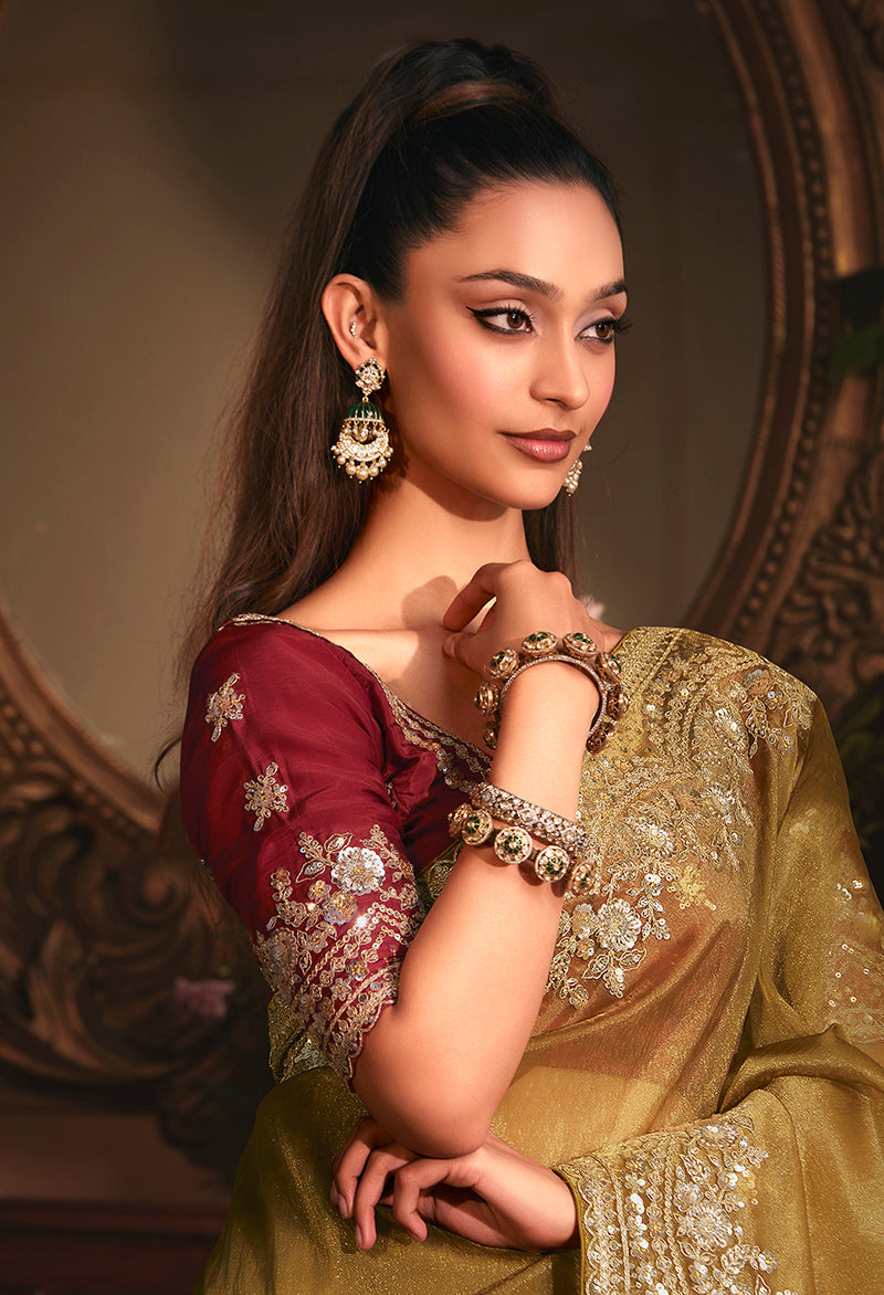 Monjolika Fashion Designer Golden Tissue Organza Saree With All Over Butta Work & Heavy Stone Embellished Border | Grocsy
