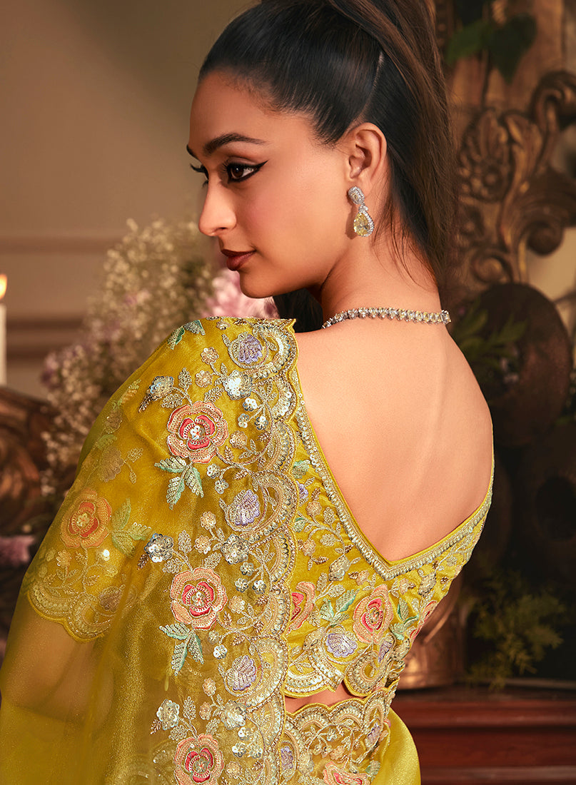 Monjolika Fashion Designer Mustard Tissue Organza Saree With All Over Butta Work & Heavy Stone Embellished Border | Grocsy