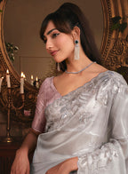 Monjolika Fashion Designer Light Grey Tissue Organza Saree With All Over Butta Work & Heavy Stone Embellished Border | Grocsy