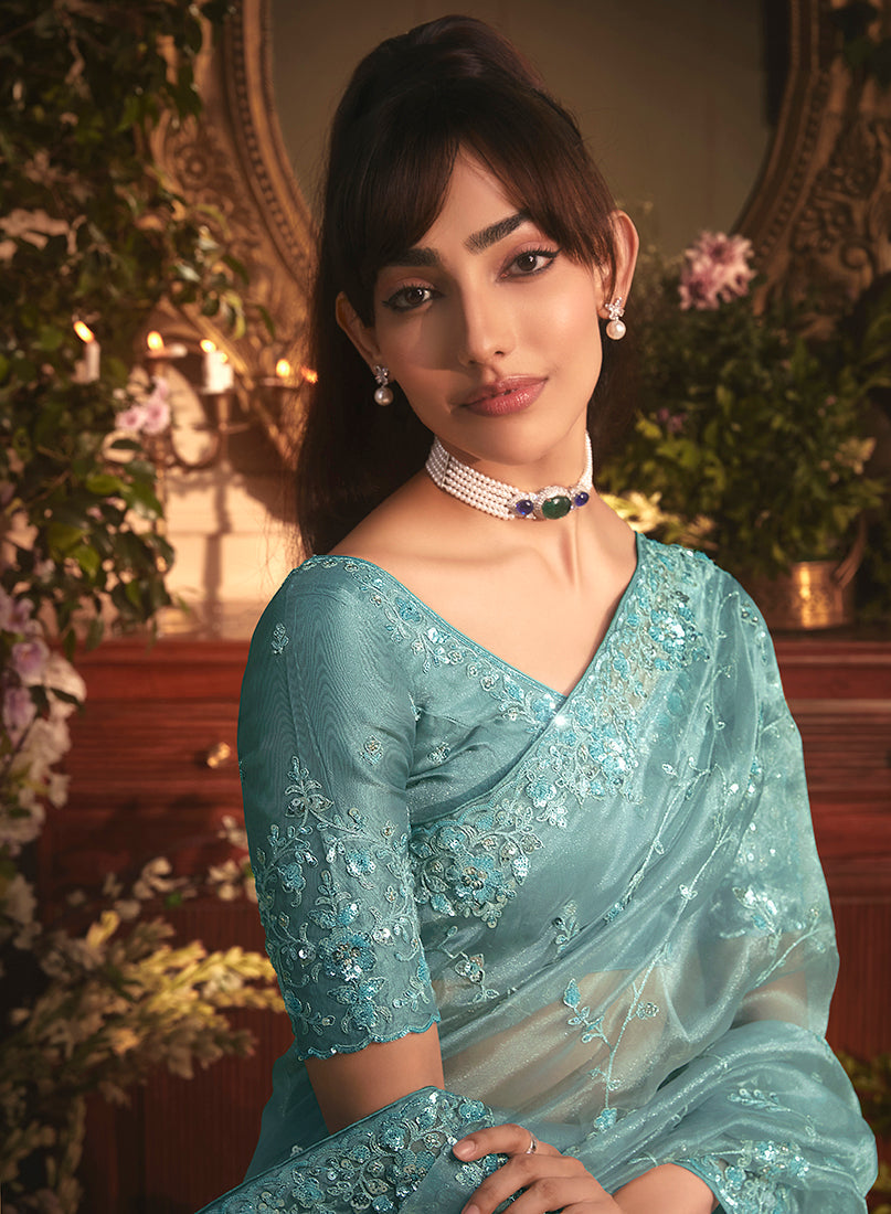 Monjolika Fashion Designer Aqua Blue Tissue Organza Saree With All Over Butta Work & Heavy Stone Embellished Border | Grocsy