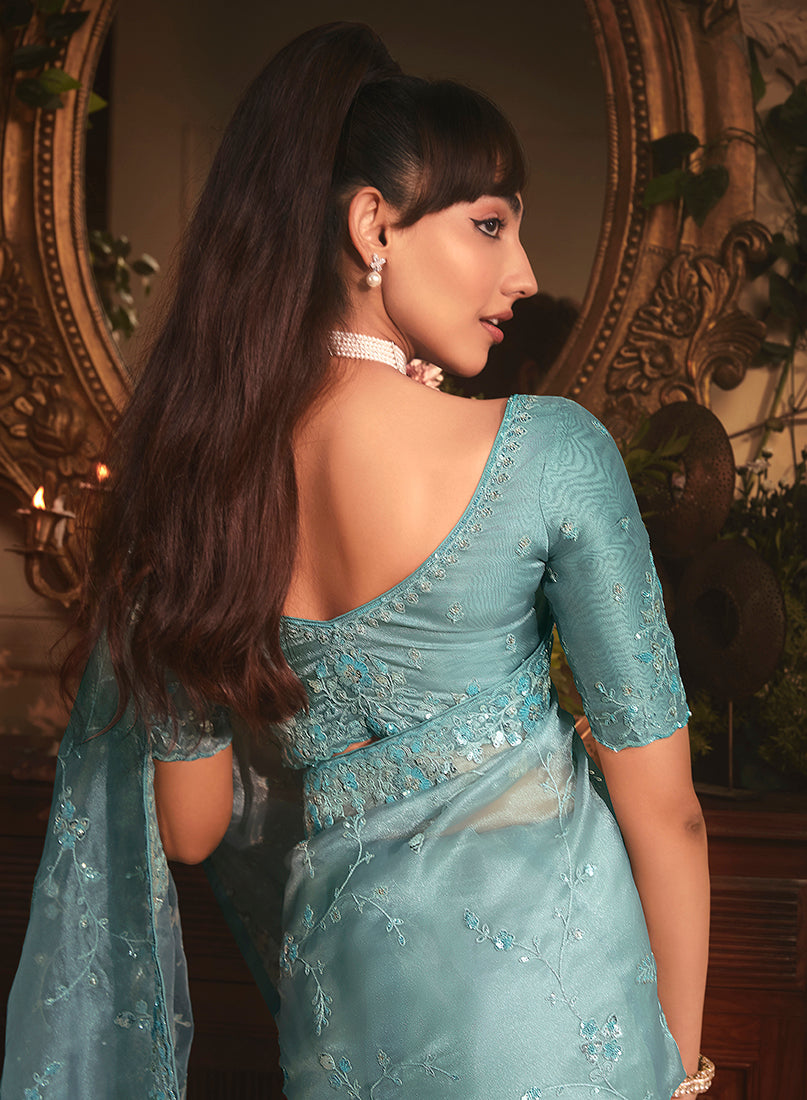 Monjolika Fashion Designer Aqua Blue Tissue Organza Saree With All Over Butta Work & Heavy Stone Embellished Border | Grocsy