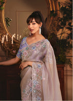 Monjolika Fashion Designer Light Lilac Tissue Organza Saree With All Over Butta Work & Heavy Stone Embellished Border | Grocsy