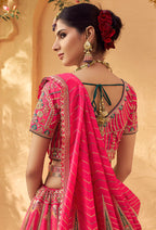Monjolika Fashion Hot Pink & Peach Banarasi Silk Wedding Wear Lehenga With Embroidery Work | Grocsy