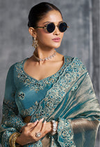 Monjolika Fashion Teal Blue Tissue Traditional Saree with Embroidered, Resham and Thread Work for Ceremonial | Grocsy