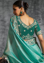 Monjolika Fashion Turquoise Tissue Traditional Saree with Embroidered, Resham and Thread Work for Ceremonial | Grocsy