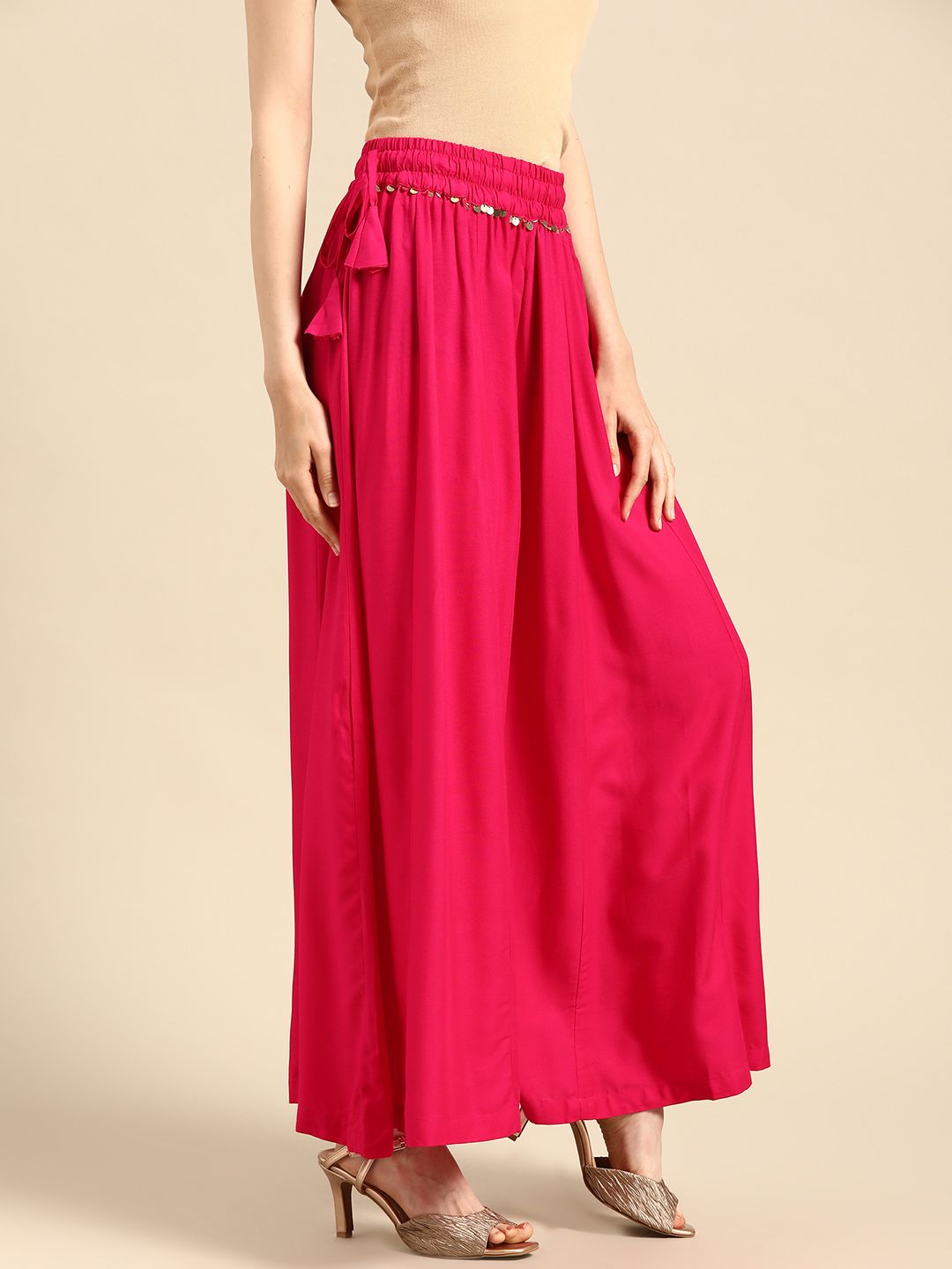 TAG 7 Women Magenta Solid Flared Palazzos | Grocsy