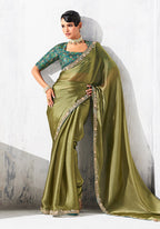 Monjolika Fashion Olive Green Fancy Fabric Embroidered Contemporary Saree | Grocsy