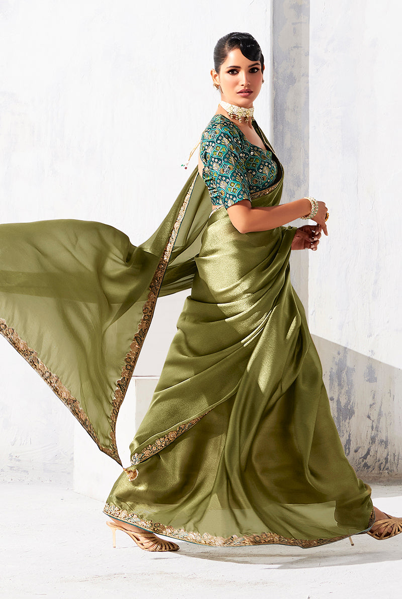 Monjolika Fashion Olive Green Fancy Fabric Embroidered Contemporary Saree | Grocsy
