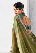 Monjolika Fashion Olive Green Fancy Fabric Embroidered Contemporary Saree | Grocsy