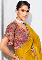Monjolika Fashion Mustard Fancy Fabric Embroidered Contemporary Saree | Grocsy