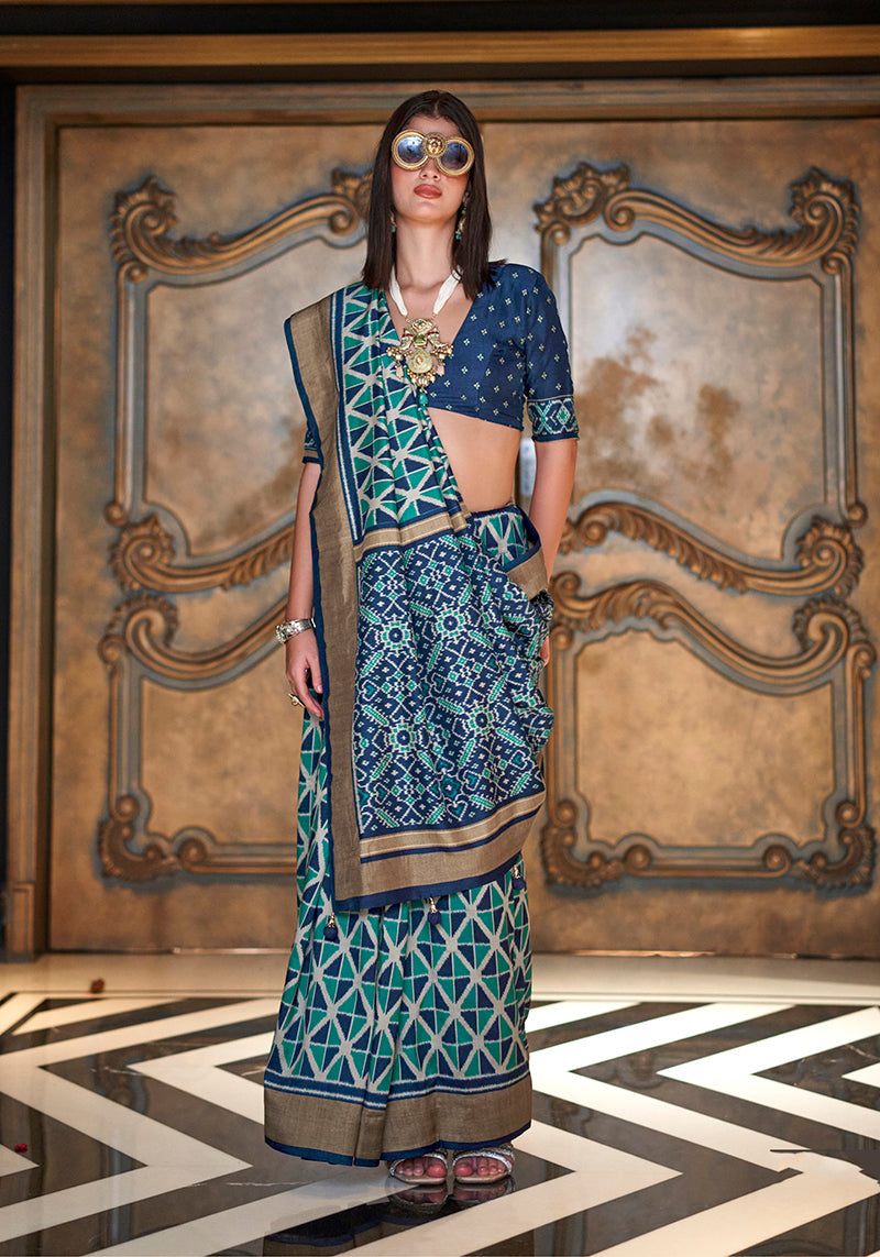 Monjolika Fashion Teal Double Ikkat Silk Blend Foil Printed Saree | Grocsy