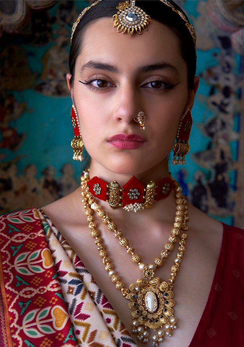 Monjolika Fashion Silk Blend Cream and Red Patola Print Classic Festival Wear Saree | Grocsy