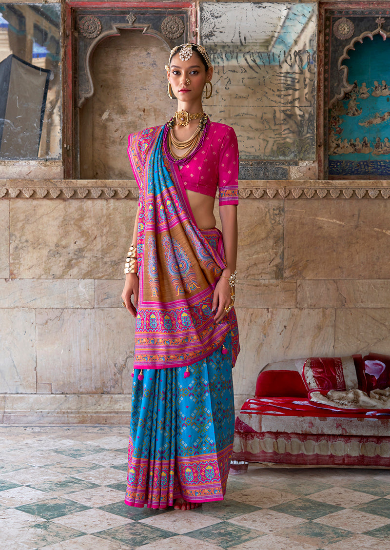 Monjolika Fashion Silk Blend Aqua Blue and Pink Patola Print Classic Festival Wear Saree | Grocsy