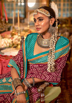 Monjolika Fashion Wine & Turquoise Patola Design Zari Work Traditional Silk Blend Saree | Grocsy