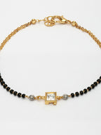 NVR Women Gold-Polished & Black Brass Stone-Studded Hand Mangalsutra Link Bracelet | Grocsy