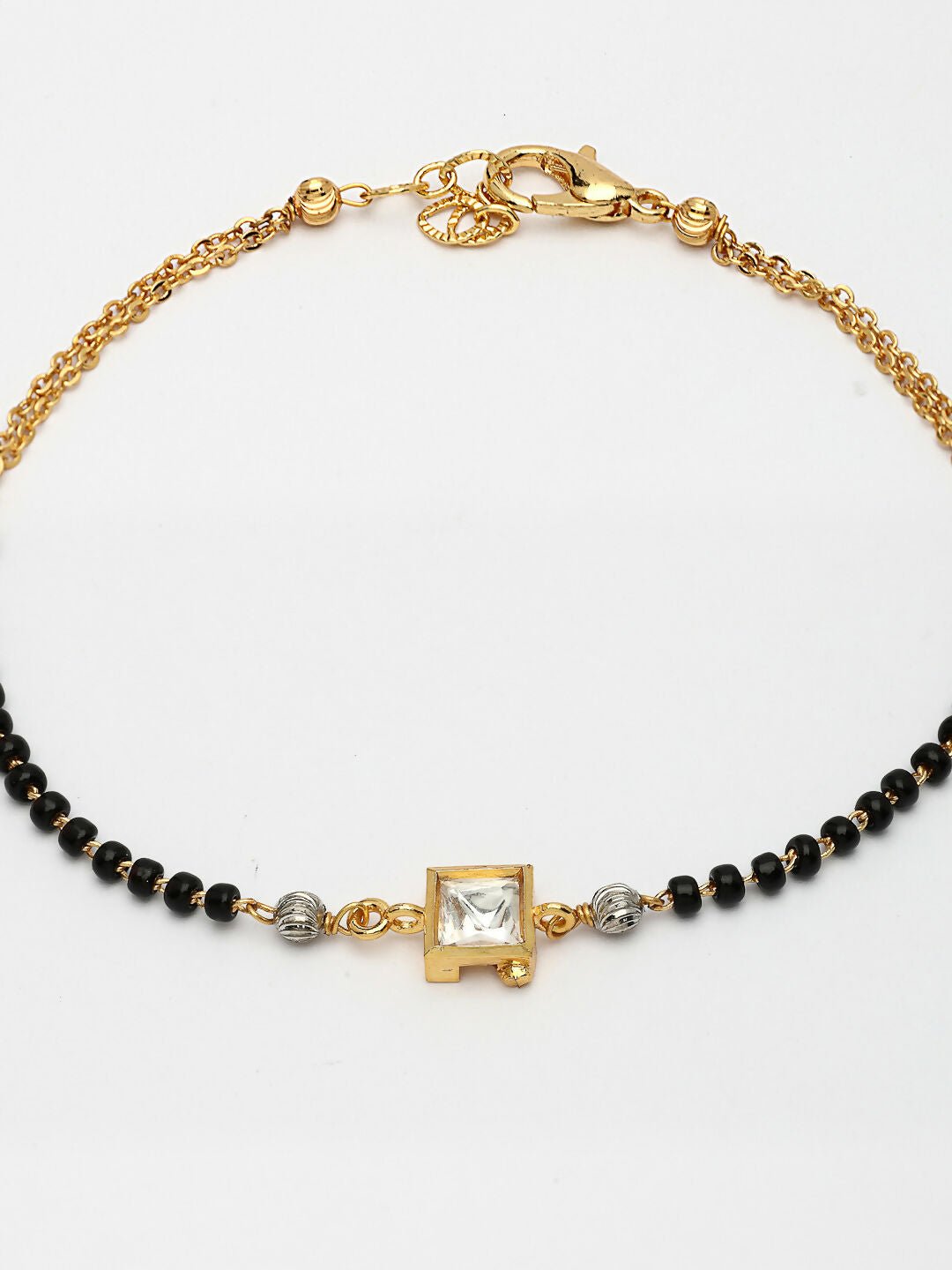 NVR Women Gold-Polished & Black Brass Stone-Studded Hand Mangalsutra Link Bracelet | Grocsy