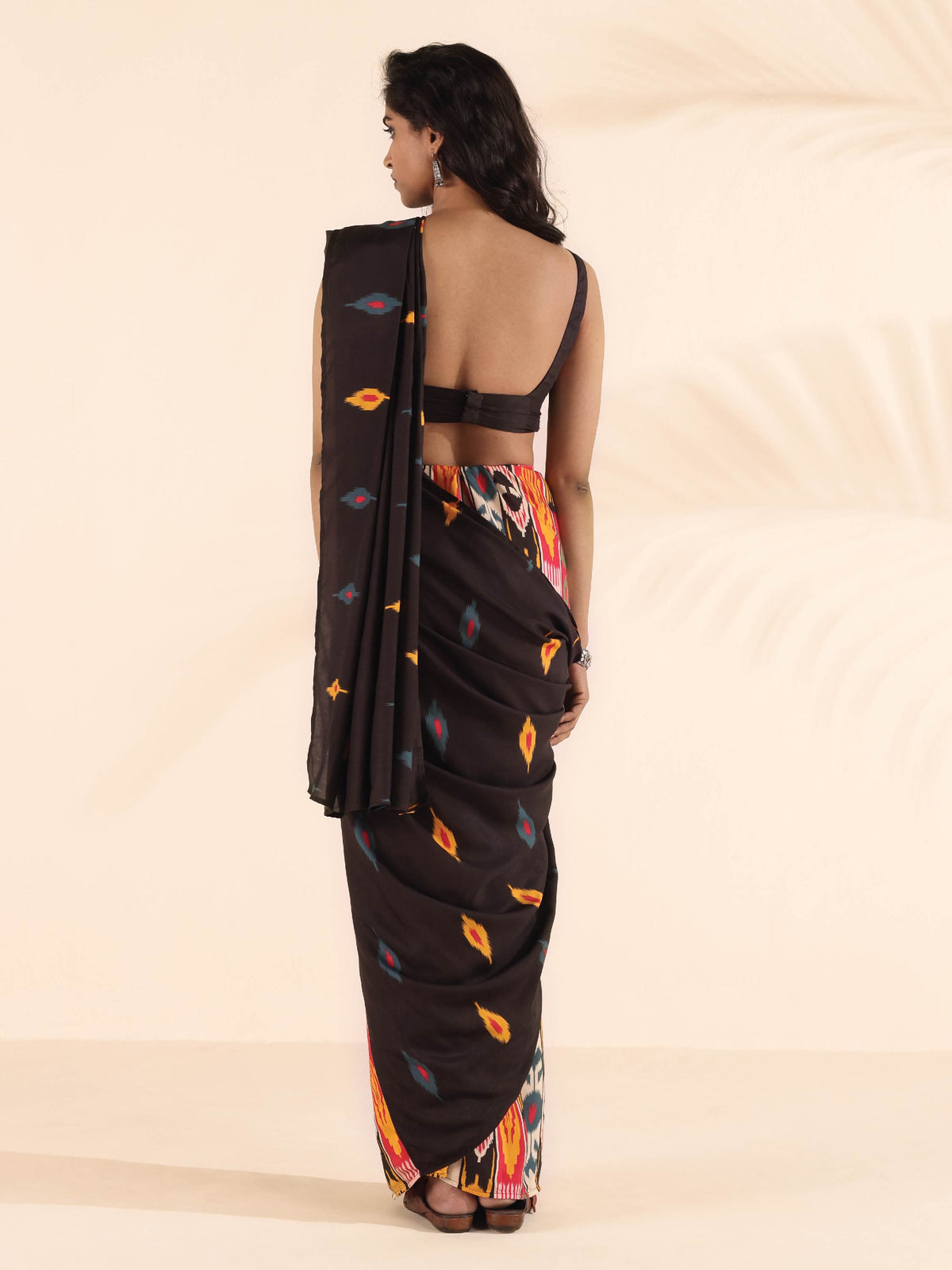 trueBrowns Cola Muslin Ikat Saree | Grocsy