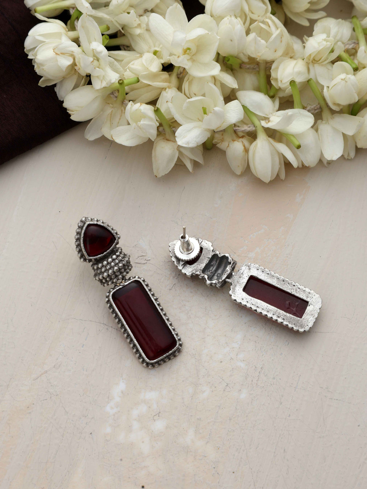 trueBrowns Silver tone Red Stone Drop Earrings - Swadesiicart