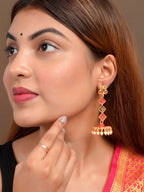 Shoshaa Gold-Toned Contemporary Jhumka Earrings | Grocsy