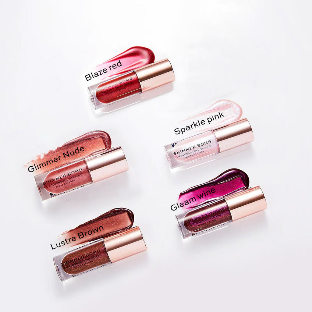 Makeup Revolution Shimmer Bomb Lip Gloss Infused With Vitamin E For Extra Nourishment - Glimmer Nude | Grocsy
