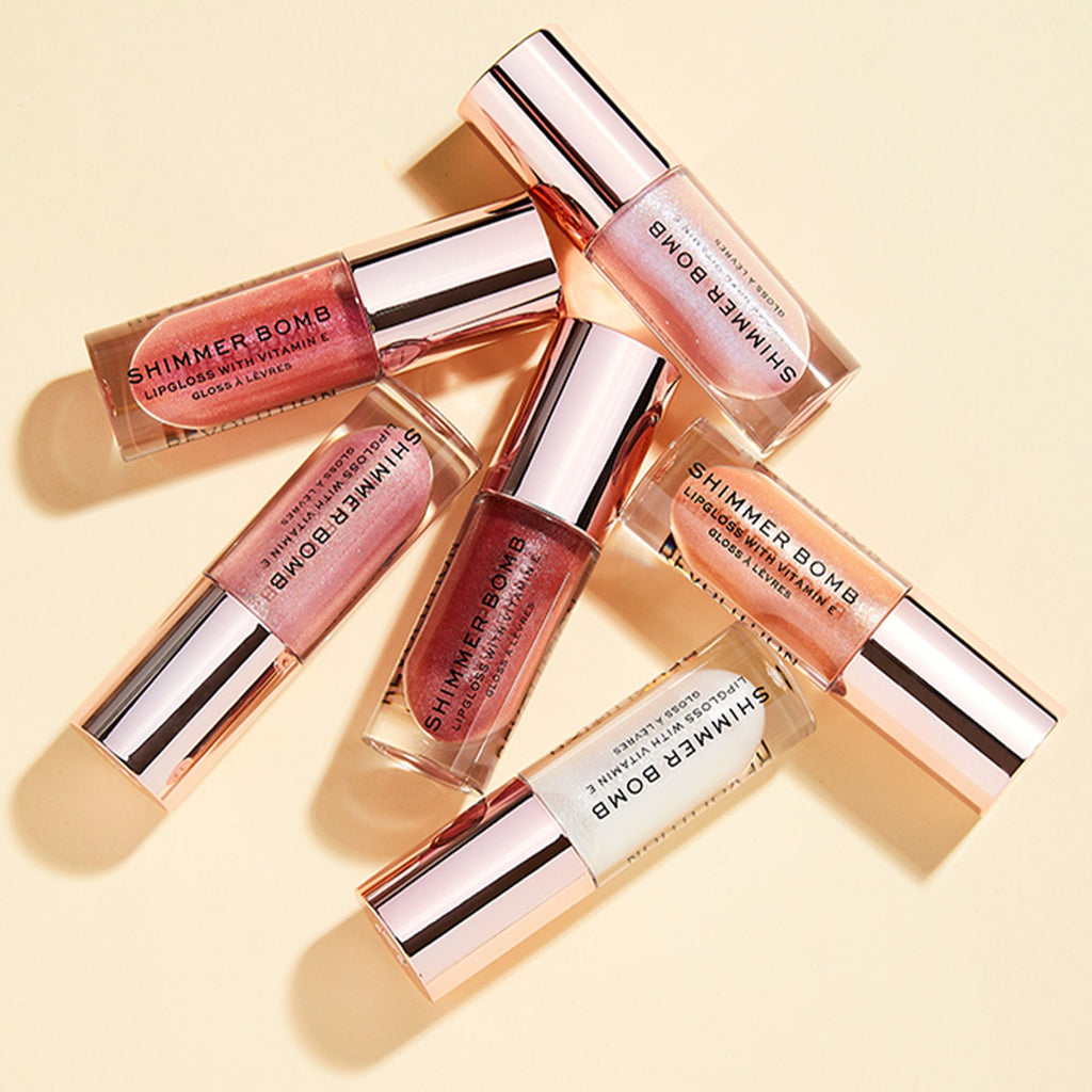 Makeup Revolution Shimmer Bomb Lip Gloss Infused With Vitamin E For Extra Nourishment - Glimmer Nude | Grocsy