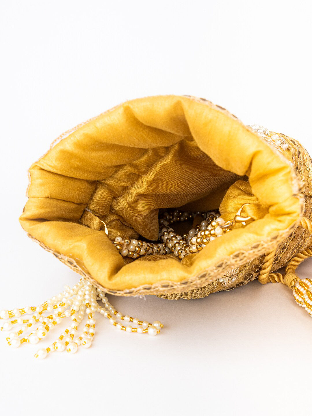 NR By Nidhi Rathi Women Gold Embroidered Potli Bag | Grocsy