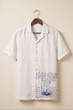 Nivra — White Embroidered Linen Shirt by Hilo Design | Grocsy