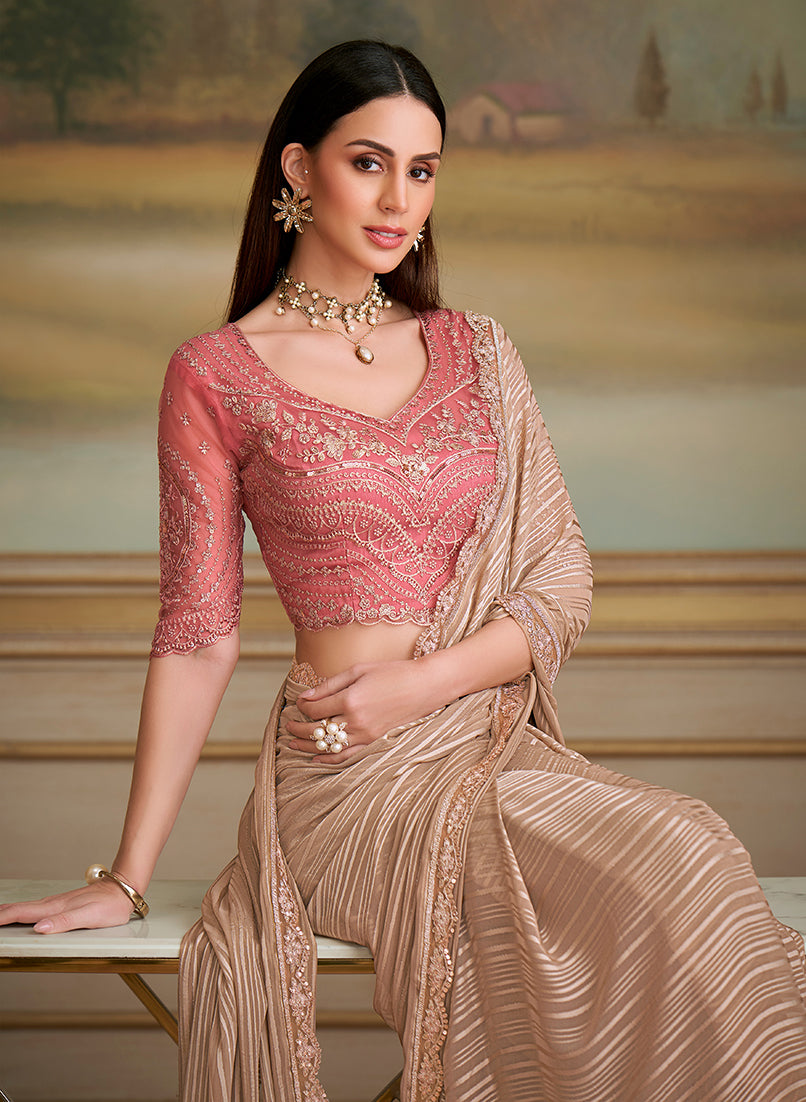 Monjolika Fashion Chiku Gold Satin Georgette Embroidered Border Party Trendy Saree | Grocsy