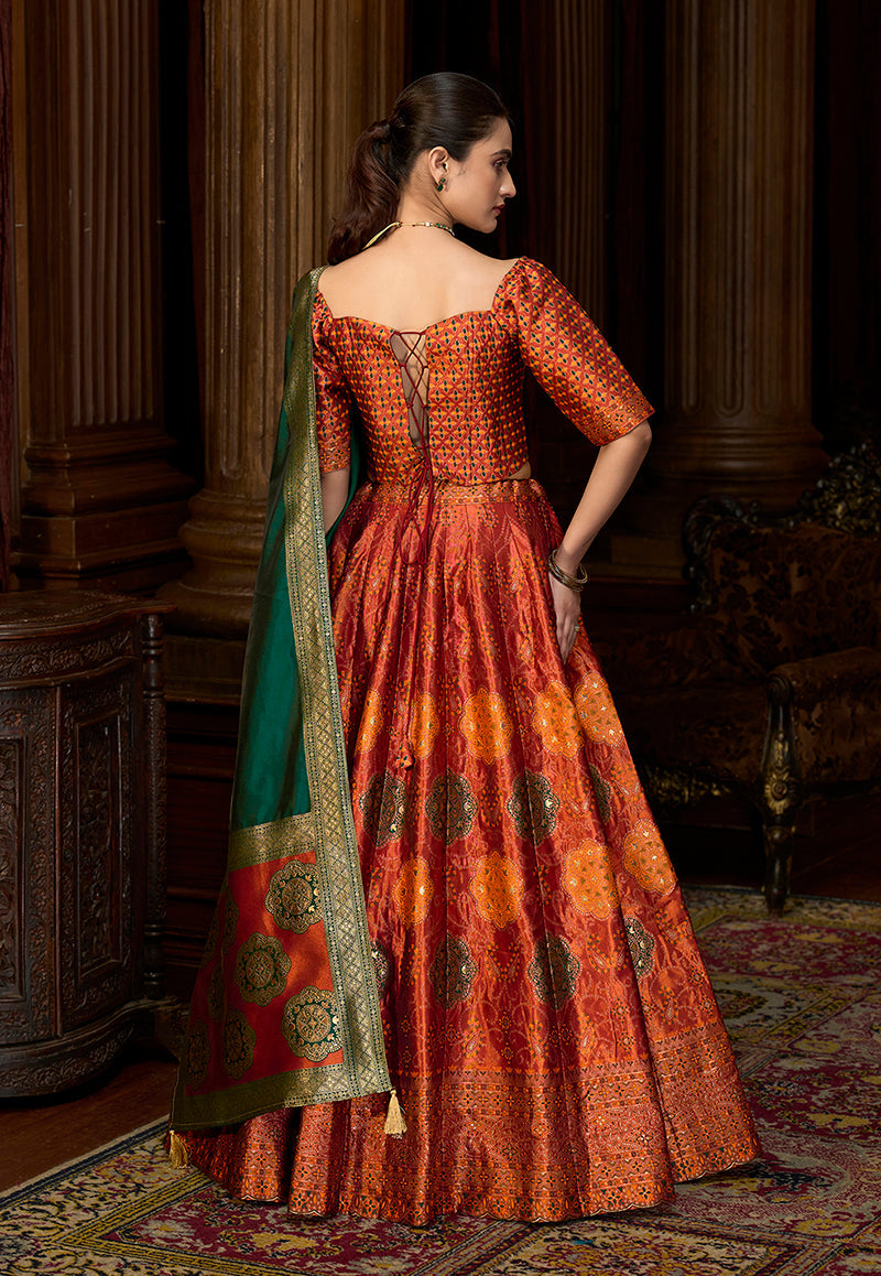 Monjolika Fashion Rust Color Kanjivaram Silk Jacquard Designer Lehenga Choli | Grocsy