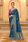 Monjolika Fashion Teal Blue Faux Crepe Silk with beautiful Zari Weaving Work Classic Saree | Grocsy