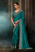 Monjolika Fashion Teal Faux Satin Embroidery Bridal Reception Festival Wedding Wear Heavy Border Saree | Grocsy