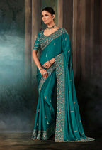 Monjolika Fashion Teal Faux Satin Embroidery Bridal Reception Festival Wedding Wear Heavy Border Saree | Grocsy