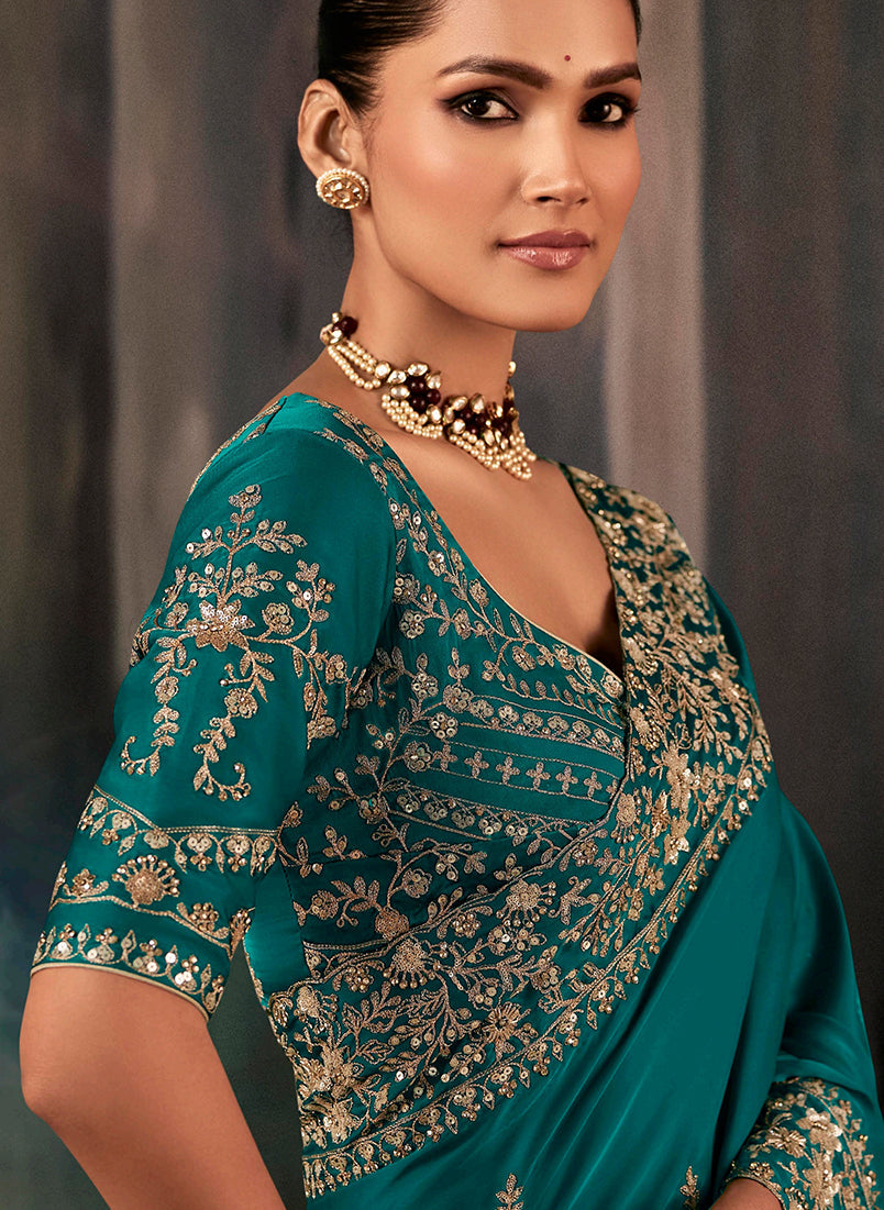 Monjolika Fashion Teal Faux Satin Embroidery Bridal Reception Festival Wedding Wear Heavy Border Saree | Grocsy