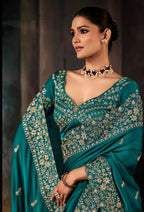 Monjolika Fashion Teal Faux Satin Embroidery Bridal Reception Festival Wedding Wear Heavy Border Saree | Grocsy