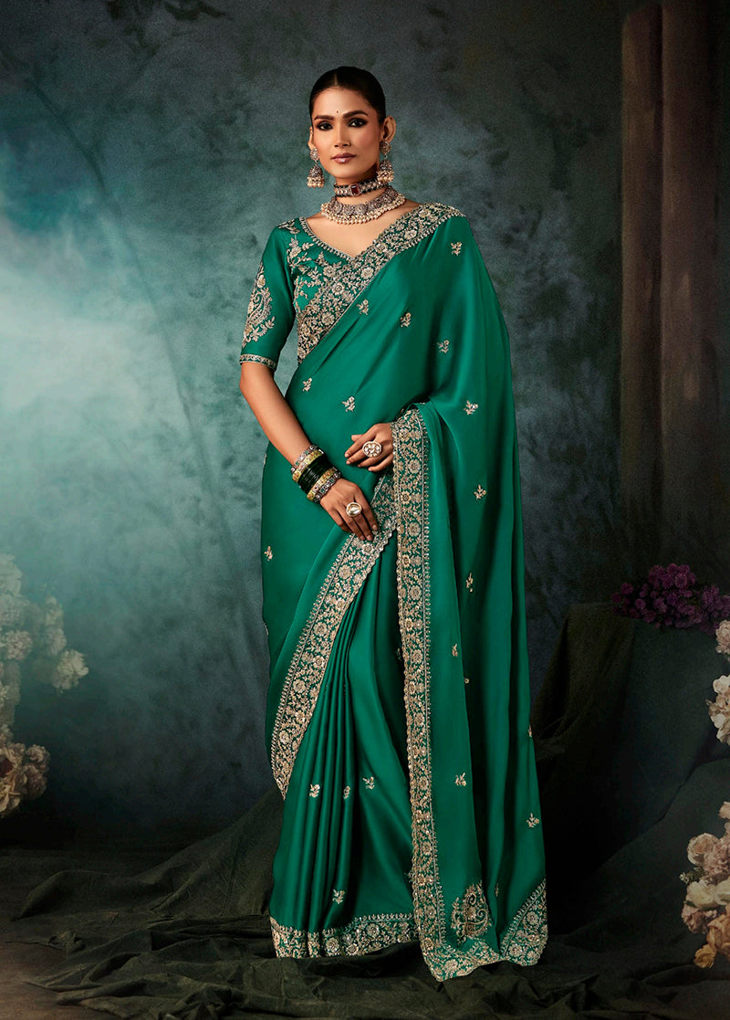 Monjolika Fashion Teal Green Faux Satin Embroidery Bridal Reception Festival Wedding Wear Heavy Border Saree | Grocsy