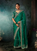Monjolika Fashion Teal Green Faux Satin Embroidery Bridal Reception Festival Wedding Wear Heavy Border Saree | Grocsy