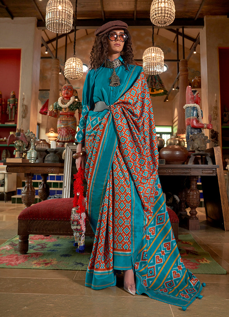 Monjolika Fashion Aqua Blue and Rust Silk Blend Ikat Print Work Contemporary Saree | Grocsy