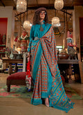 Monjolika Fashion Aqua Blue and Rust Silk Blend Ikat Print Work Contemporary Saree | Grocsy