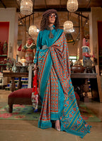 Monjolika Fashion Aqua Blue and Rust Silk Blend Ikat Print Work Contemporary Saree | Grocsy